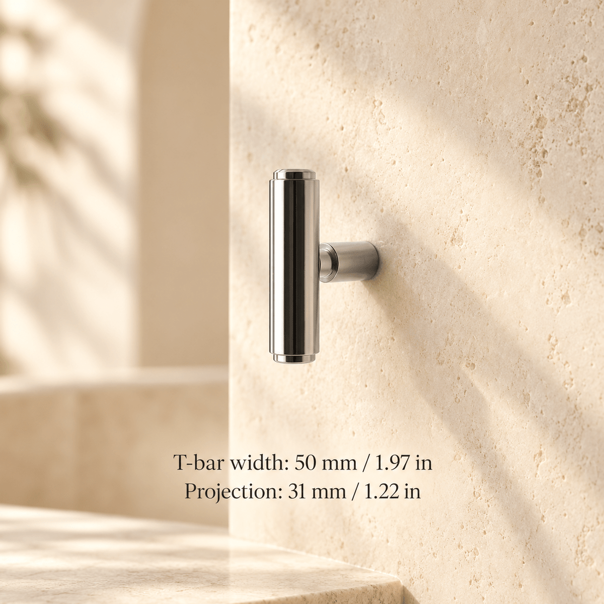 silver T knob in ivory studio. T-bar width: 50 mm / 1.97 in; Projection: 31 mm / 1.22 in
