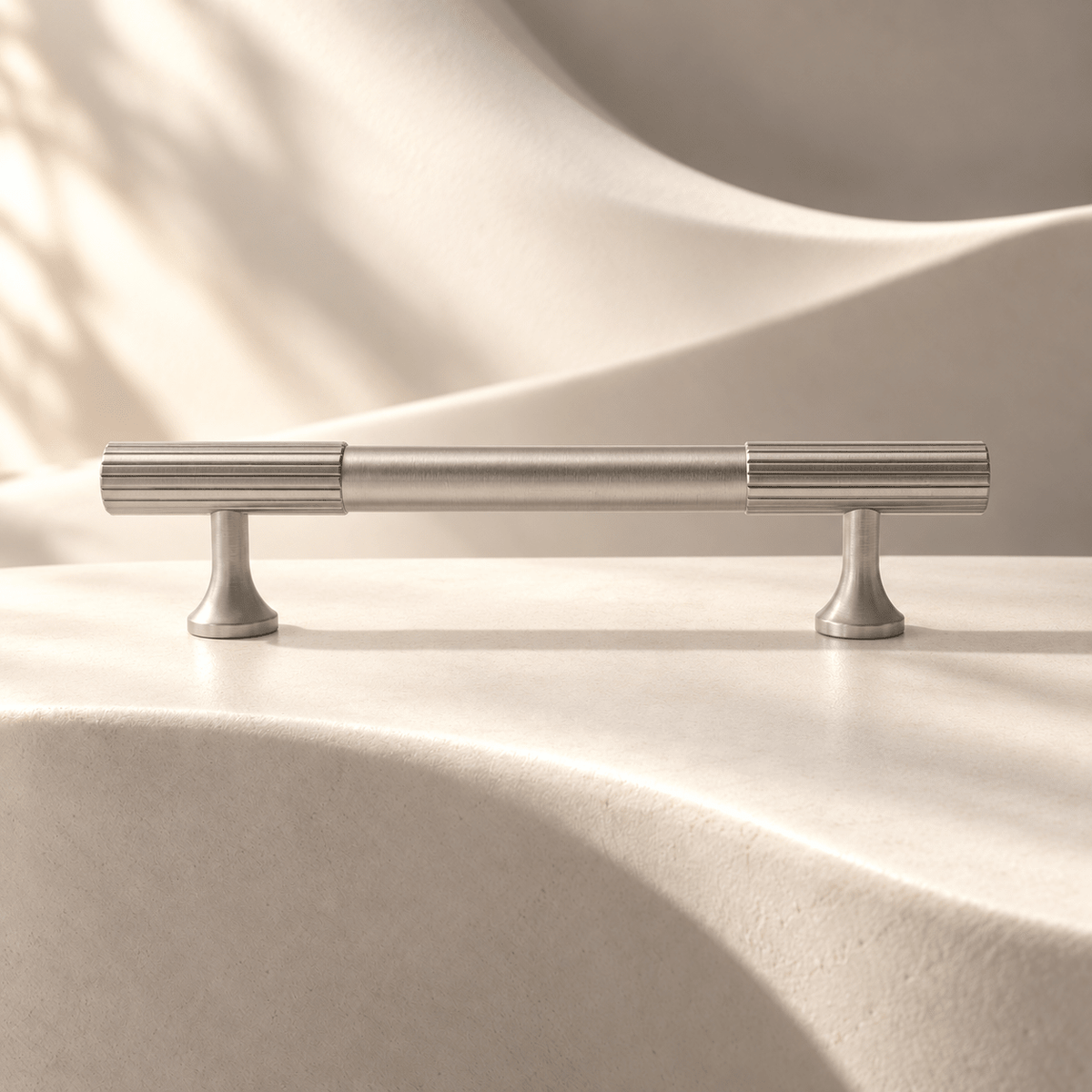 Satin nickel fluted-end pull, 96 mm CTC — warm ivory stone studio