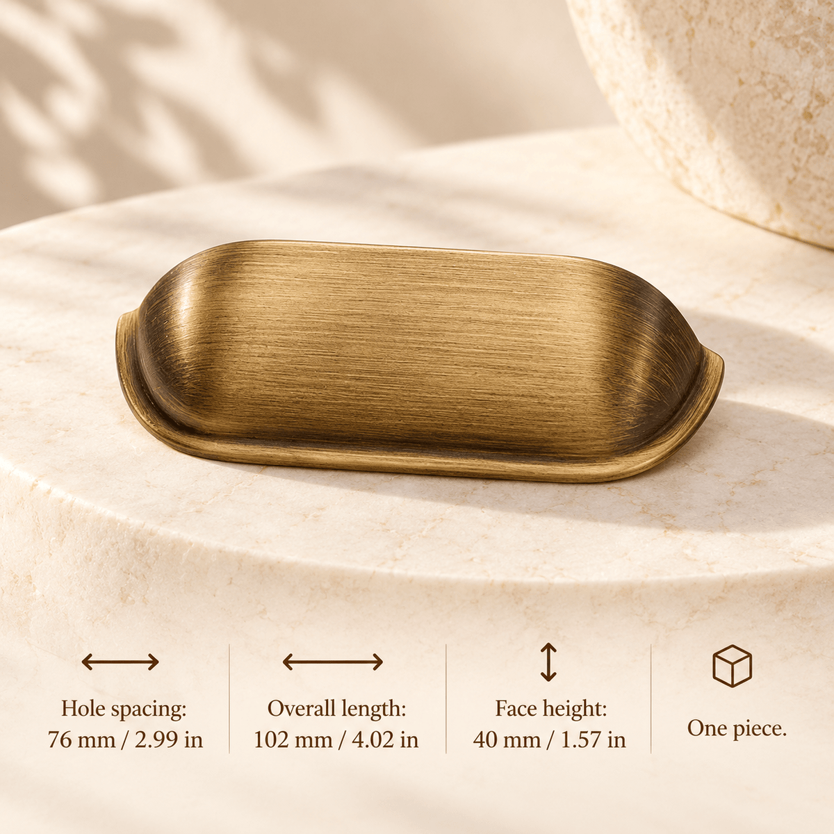 antique bronze shell cup pull in ivory studio. Hole spacing: 76 mm / 2.99 in; Overall length: 102 mm / 4.02 in; Face height: 40 mm / 1.57 in; One piece