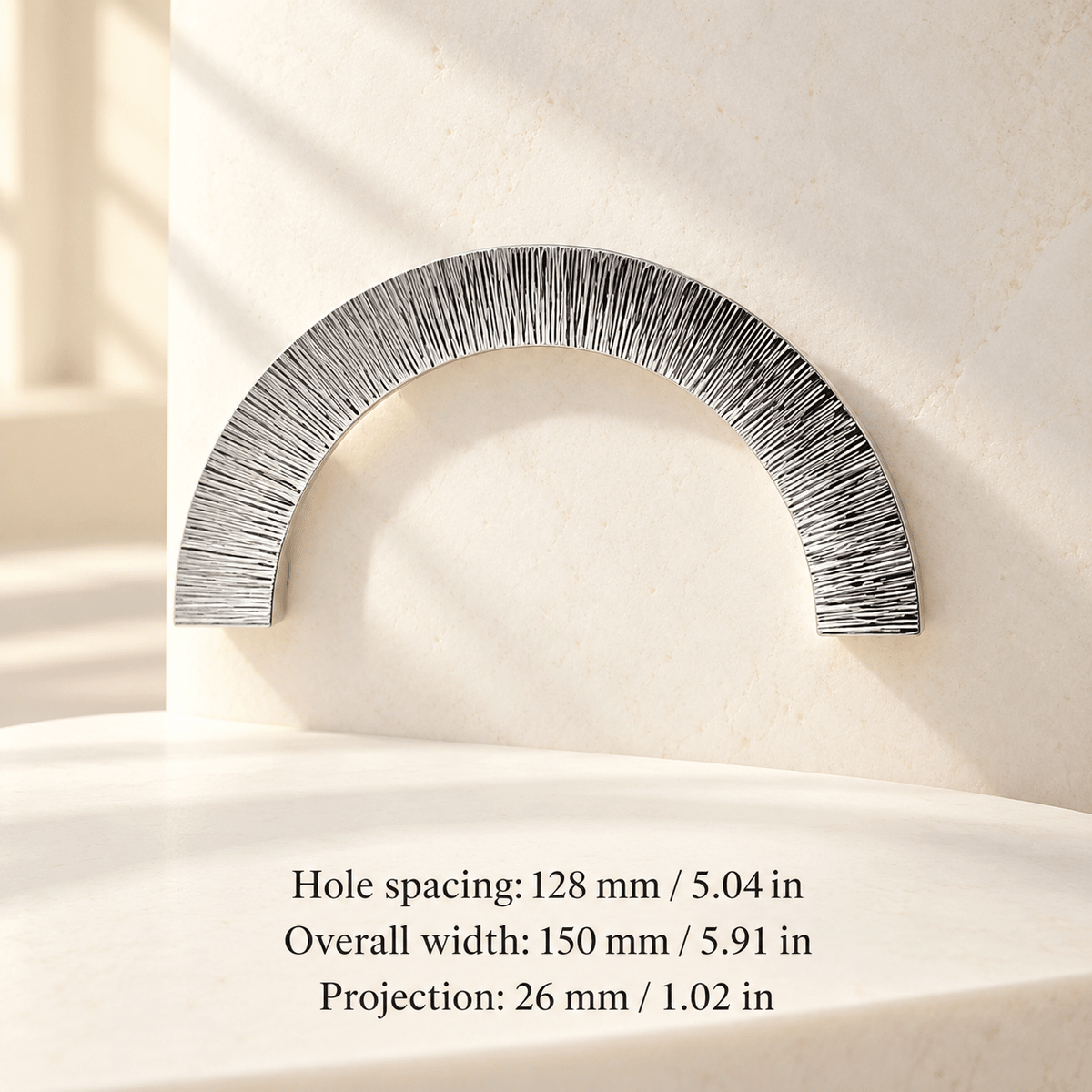 Silver sunburst open semicircle arc pull in ivory studio. Hole spacing: 128 mm / 5.04 in; Overall width: 150 mm / 5.91 in; Projection: 26 mm / 1.02 in
