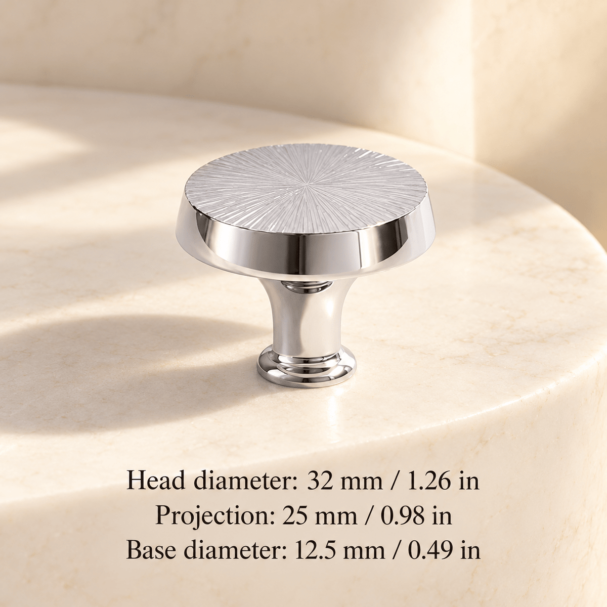 Silver sunburst round pedestal knob in ivory studio. Head diameter: 32 mm / 1.26 in; Projection: 25 mm / 0.98 in; Base diameter: 12.5 mm / 0.49 in