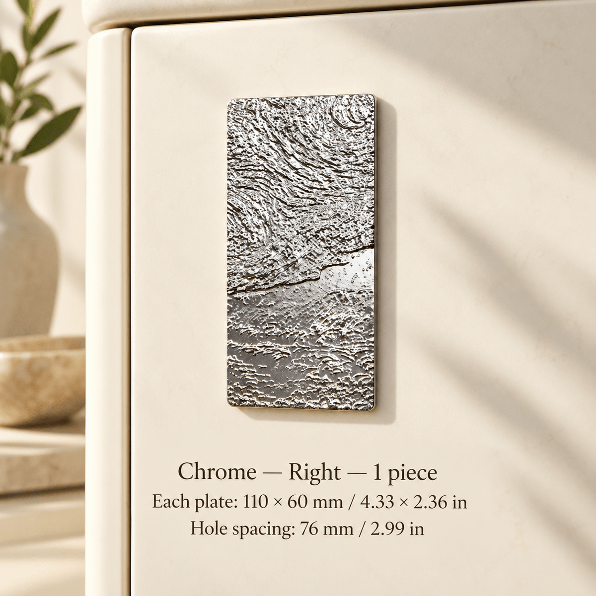 Textured chrome rectangular plate pull Chrome — right, 1 piece; Chrome — Right — 1 piece; Each plate: 110 × 60 mm / 4.33 × 2.36 in; Hole spacing: 76 mm / 2.99 in on ivory studio background