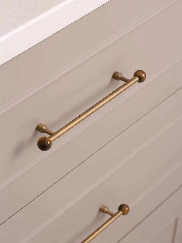 Sleek Stone & Brass Pulls – Nordic Style Handles for Cabinets