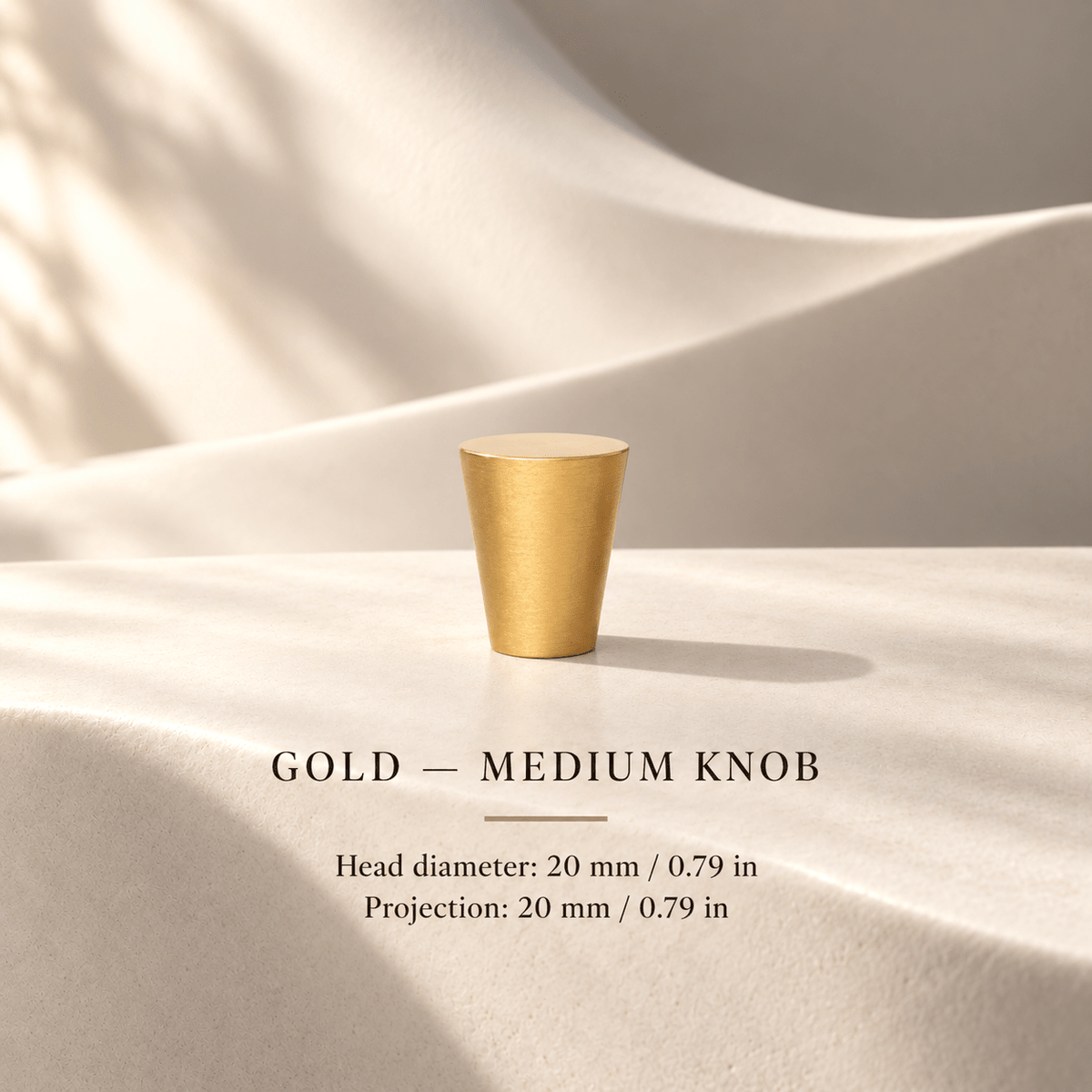 Medium tapered gold cabinet knob in ivory studio. Head diameter: 20 mm / 0.79 in; Projection: 20 mm / 0.79 in