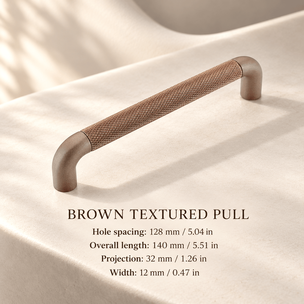 Brown textured aluminum cabinet pull — Hole spacing: 128 mm / 5.04 in; Overall length: 140 mm / 5.51 in; Projection: 32 mm / 1.26 in; Width: 12 mm / 0.47 in