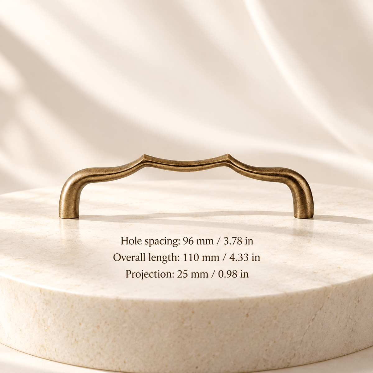 Bronze — 96 mm / 3.78 in CTC; Hole spacing: 96 mm / 3.78 in; Overall length: 110 mm / 4.33 in; Projection: 25 mm / 0.98 in on ivory stone studio background