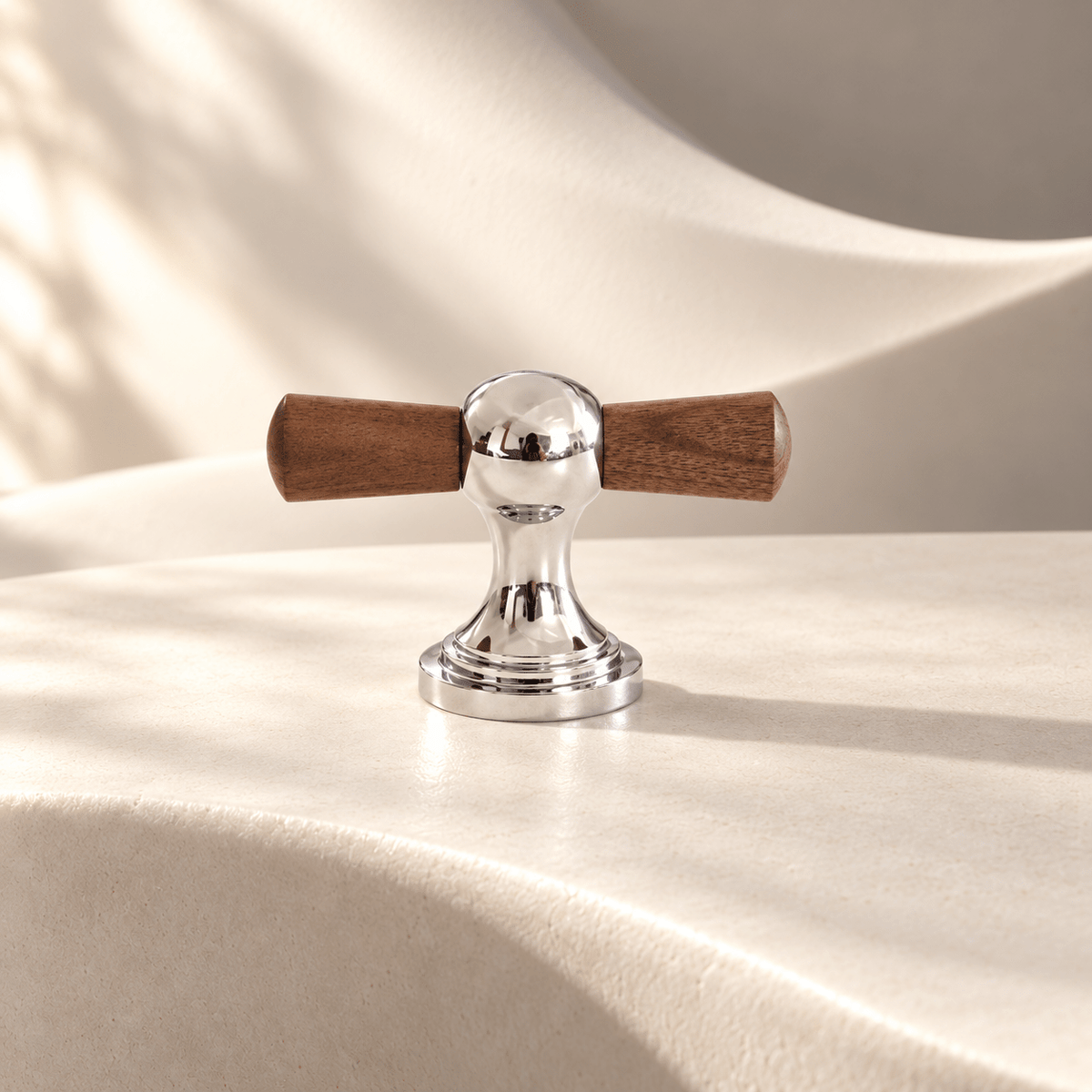 Walnut silver T-knob in warm ivory sunlight studio