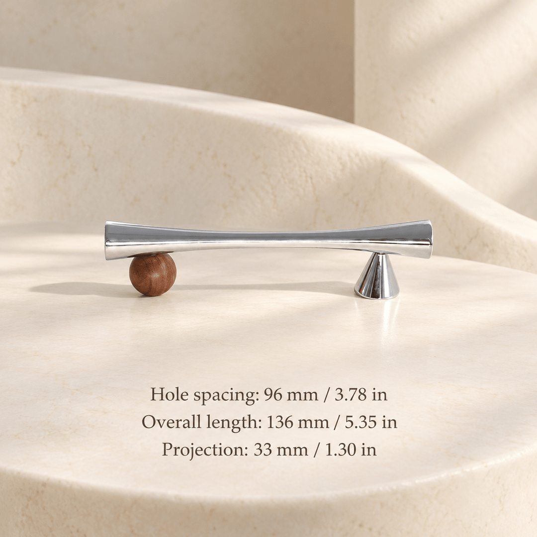 Silver cabinet pull with wooden sphere and cone supports in ivory studio. Hole spacing: 96 mm / 3.78 in; Overall length: 136 mm / 5.35 in; Projection: 33 mm / 1.30 in